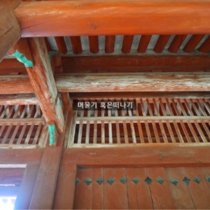 The long and majestic silhouette of the Jeongjeon Main Hall at Jongmyo Shrine