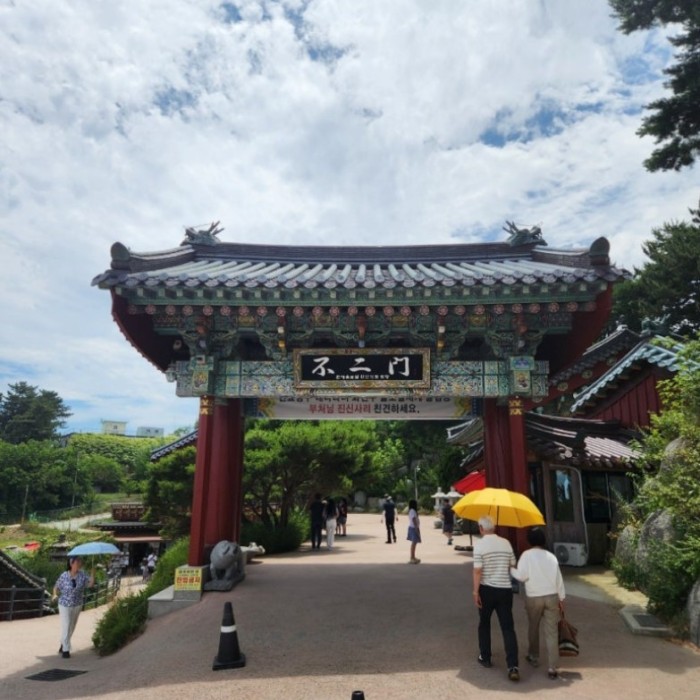 A majestic view of the coastal rocks and the East Sea at Huhuam Temple in Yangyang