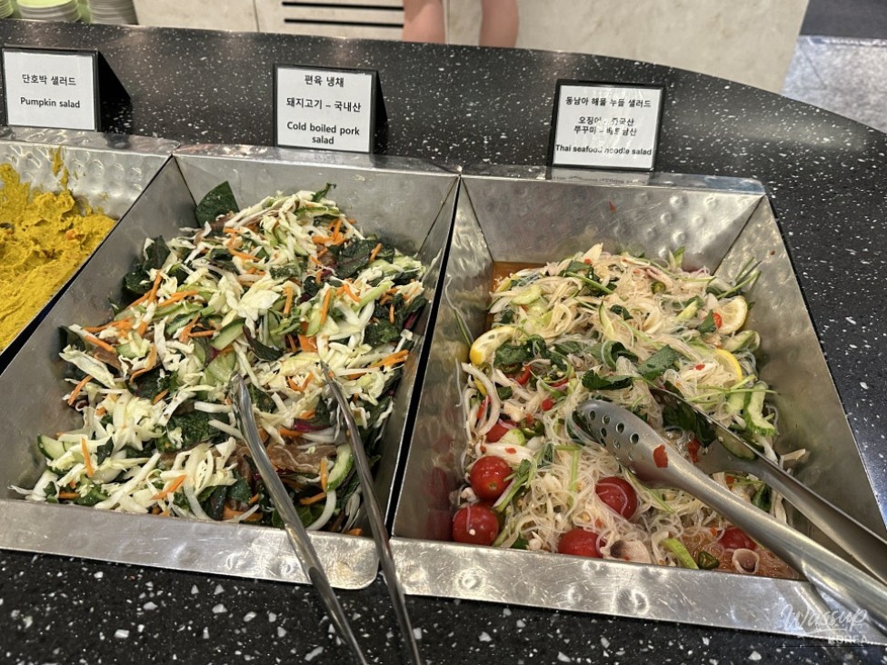 Buffet meal selection enjoyed before an international flight