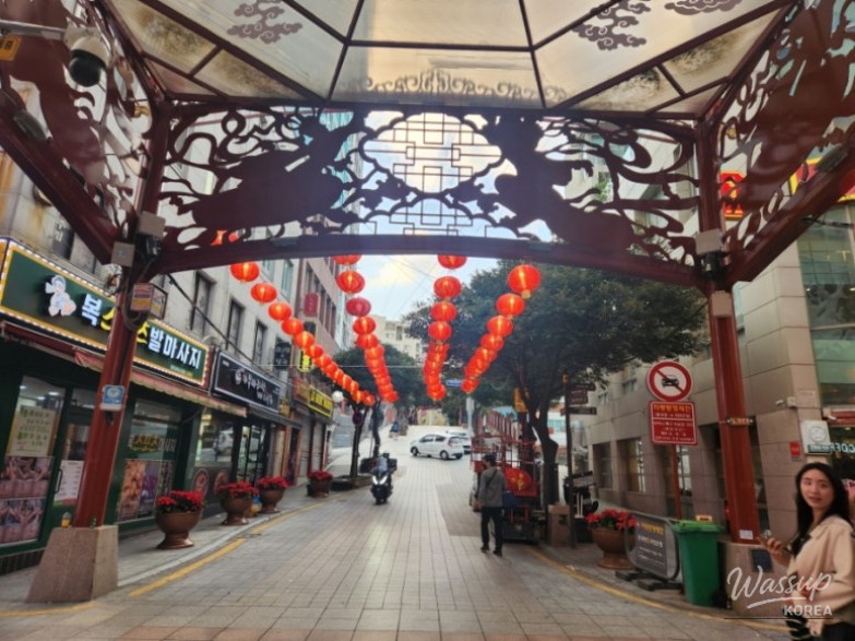 A quiet alleyway in Chinatown showcasing the unique architecture and local life