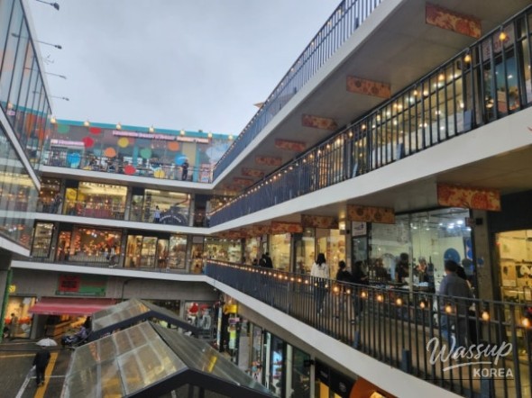 A touching scene of visitors exploring the colorful boutique shops together