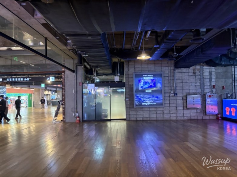 A large promotional poster for the upcoming Jujutsu Kaisen movie at Megabox entrance