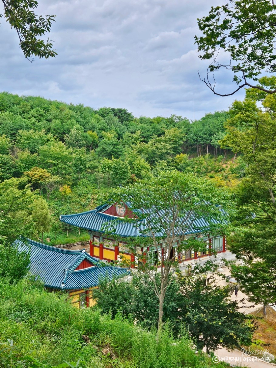 The entrance path to Naksansa Temple lined with traditional lanterns