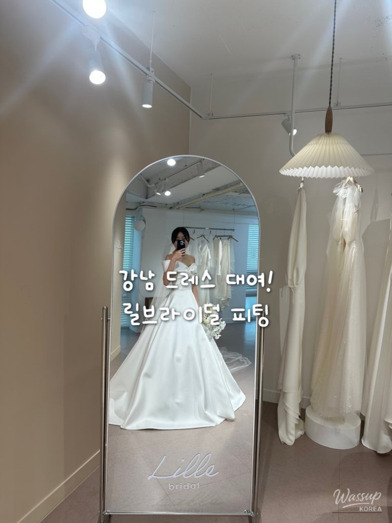 Exquisite silk wedding dress with a natural sheen displayed at Lil Bridal Gangnam