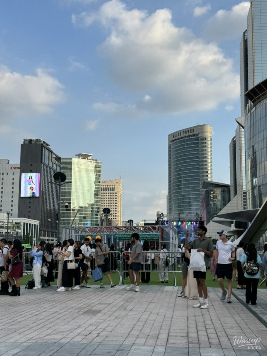 NCT WISH members performing on the house-themed stage during the showcase
