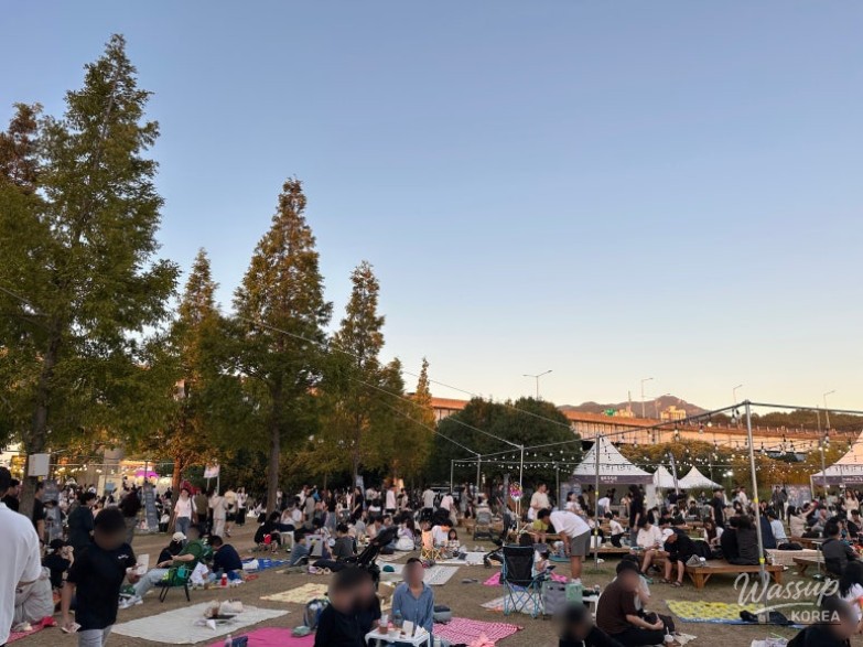 A touching moment sharing a handmade scallion pancake on a picnic