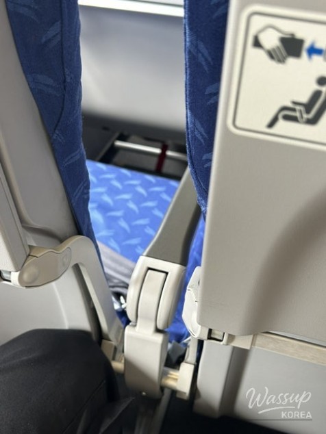 Passenger view of narrow aisle on Air Busan flight