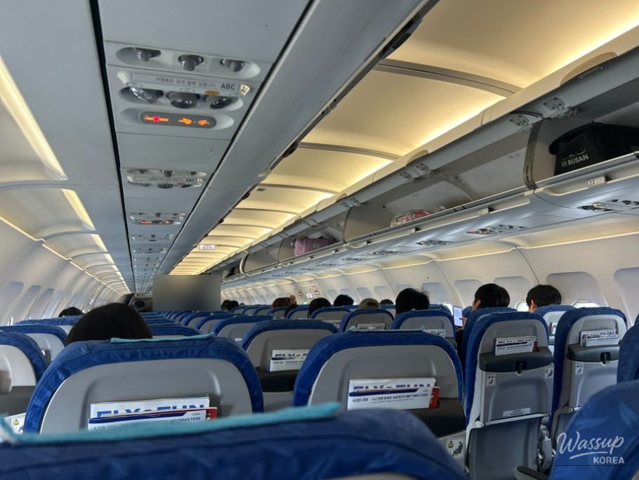 Cabin view highlighting compact seat spacing on BX171