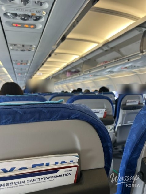 Passenger legroom touching the seat in front on Air Busan BX171