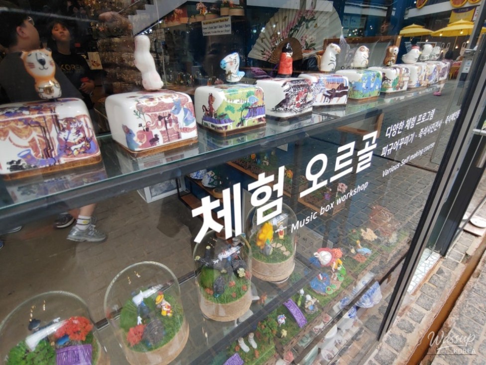 Artistic stairs and ceiling murals inside the Ssamziegil mall