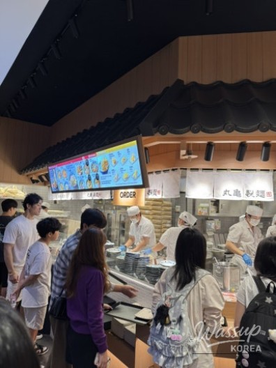 The colorful parade at Lotte World