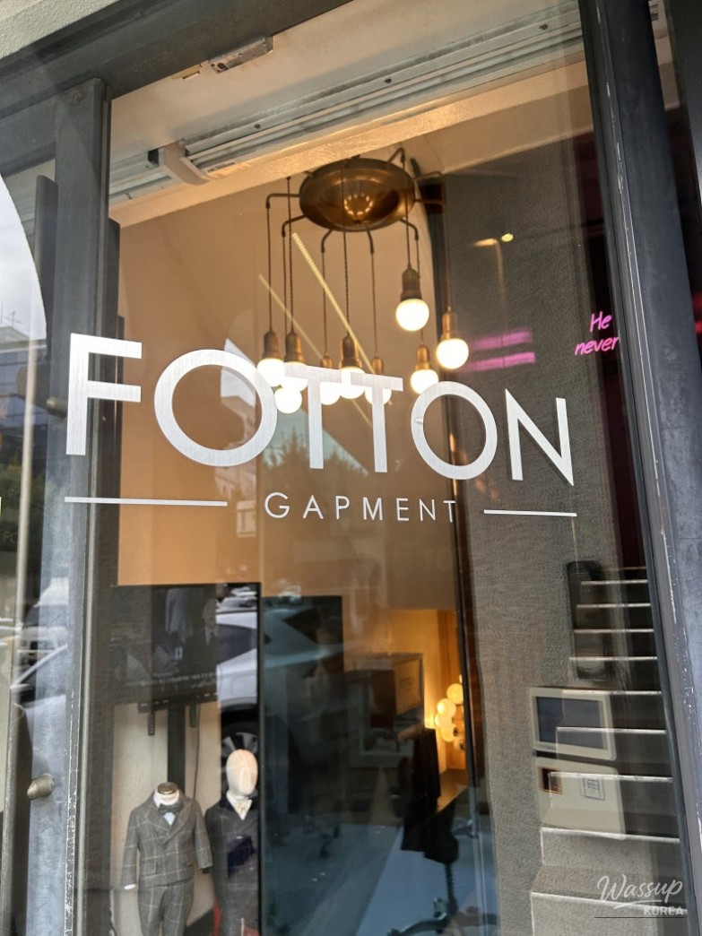 Display of various handmade shoes and accessories in the showroom