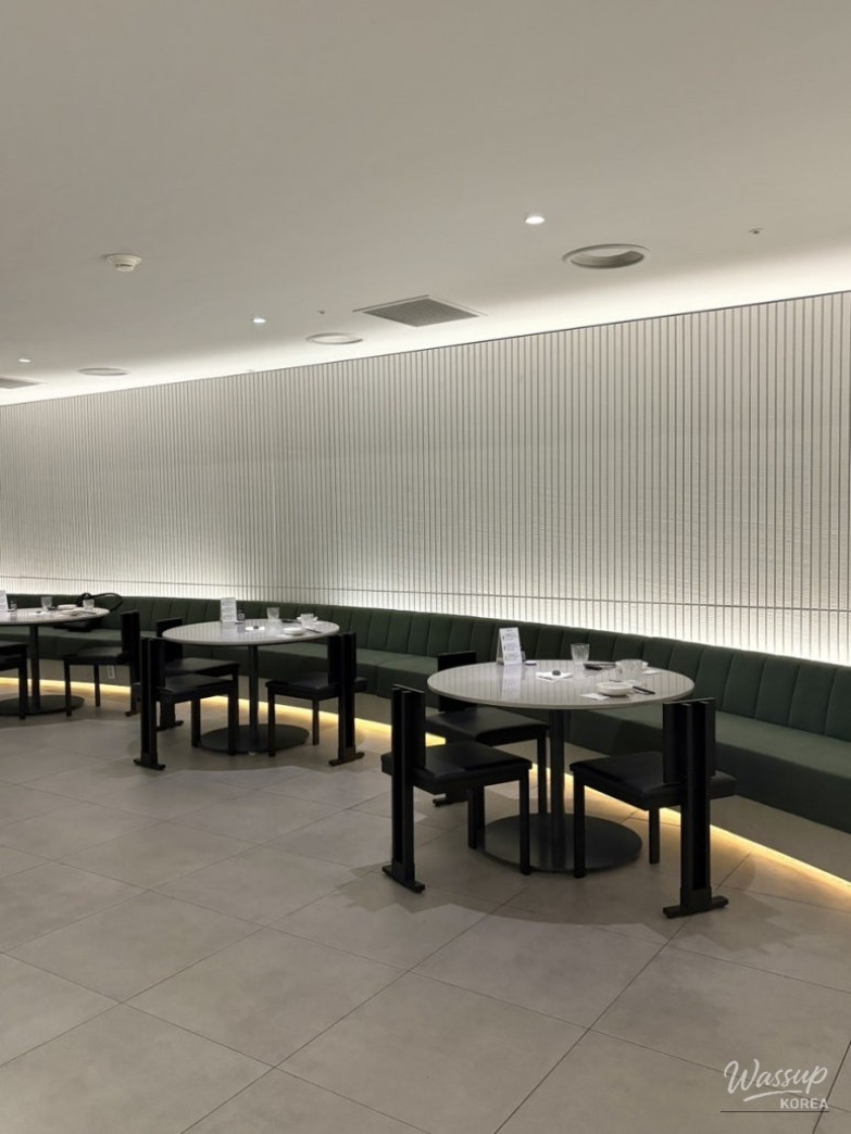 A curated display of premium wines inside the MOWa wine tunnel