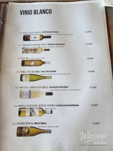 The vibrant atmosphere of the restaurant with guests enjoying their meal