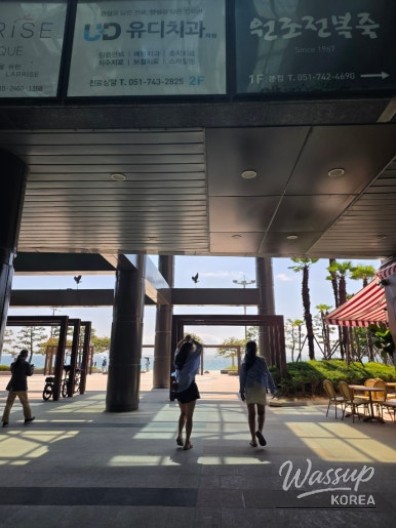 The stylish entrance and terrace of Spain Club Haeundae overlooking the beach