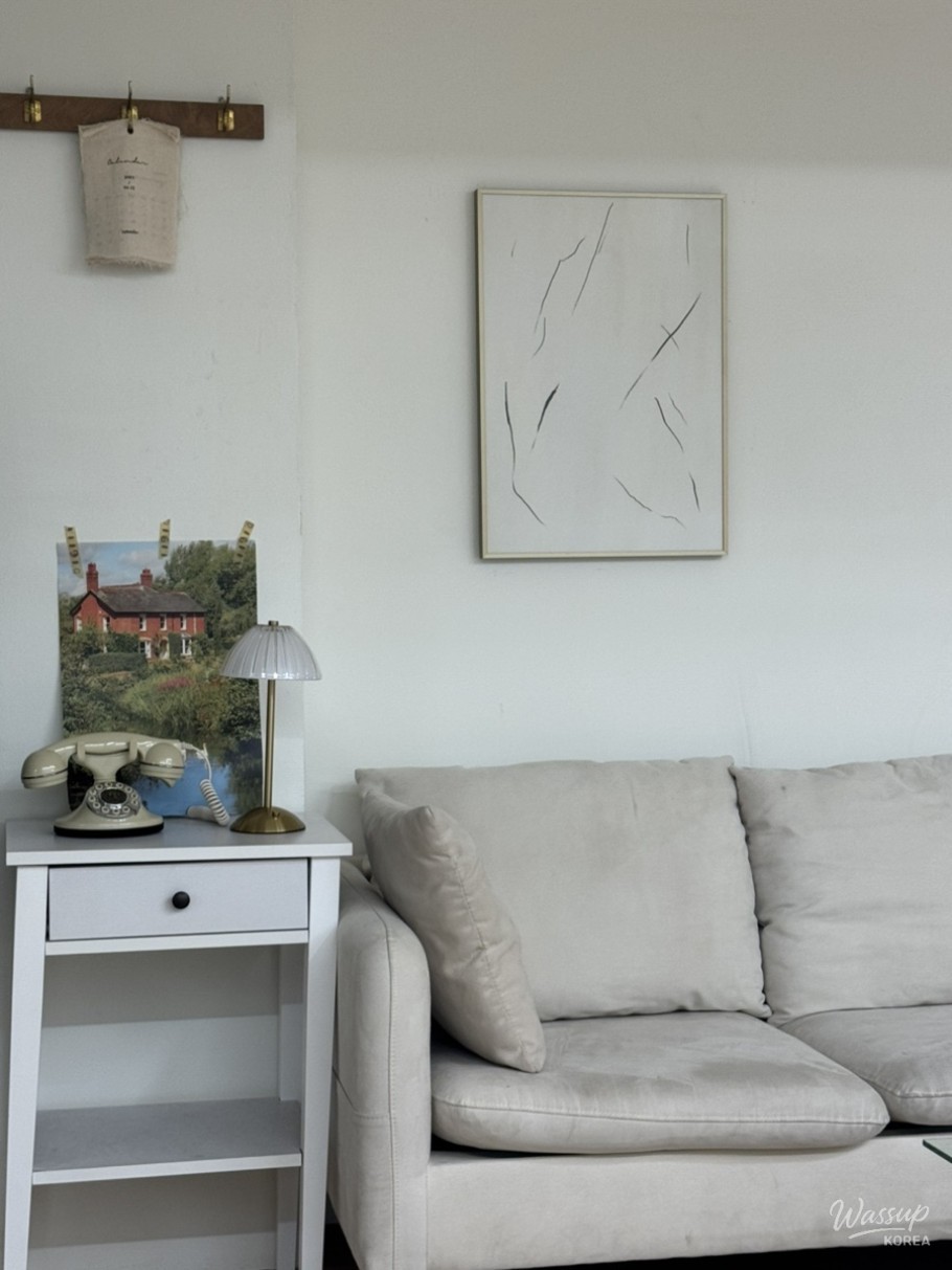 Clothing racks and hangers provided behind a private curtain