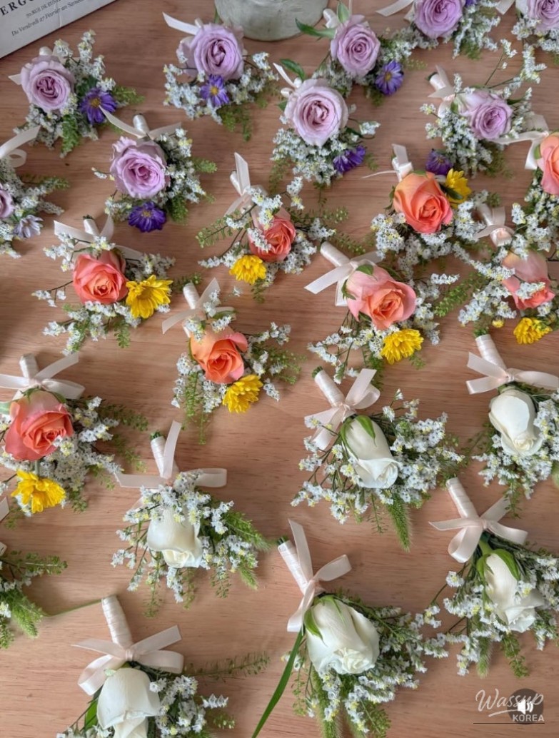 A variety of colorful bouquets ready for mass corporate event delivery