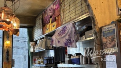 Matching silver friendship rings being showcased against a colorful background