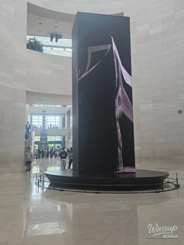 Hopeful tomorrow with a child looking up at the museum's skylight
