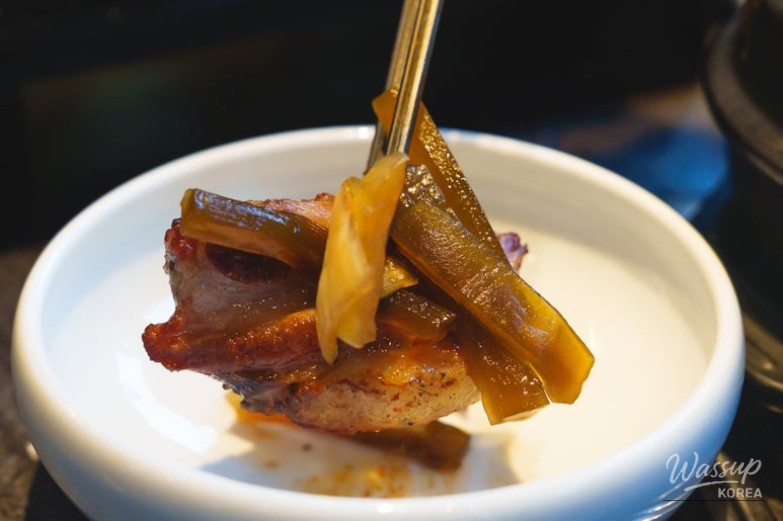 Table setting with fresh vegetable wraps and sauces