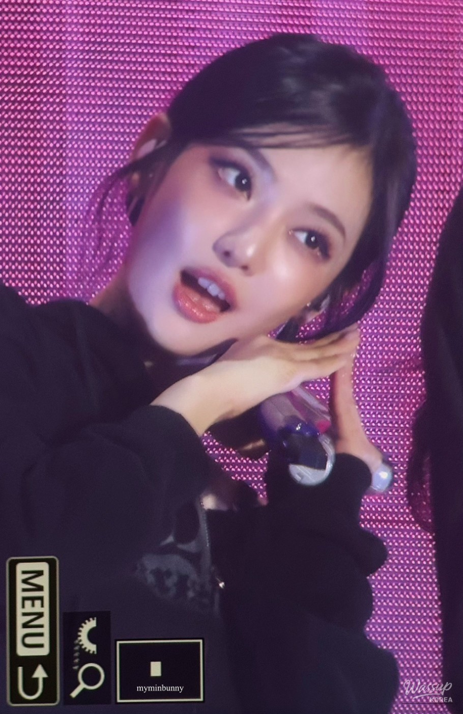 Black outfit styling balanced with luminous skin texture