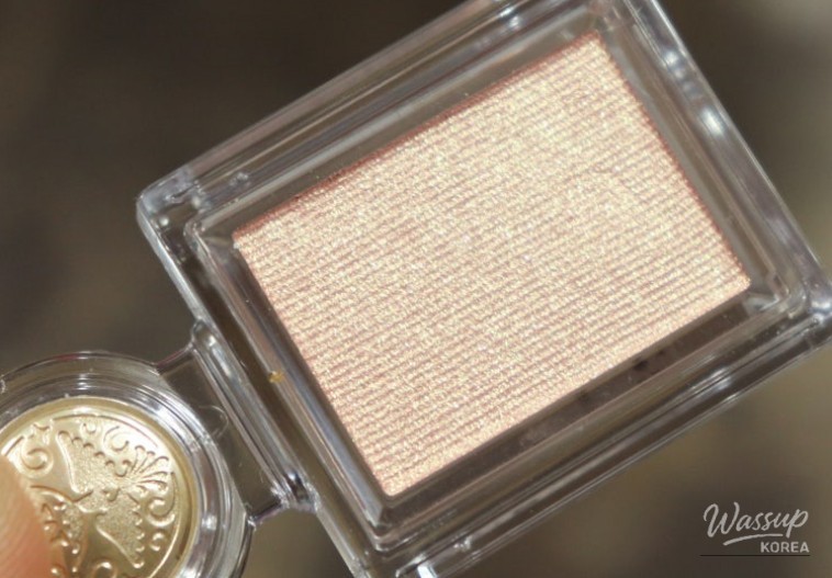 Subtle glow of undereye makeup under studio lighting