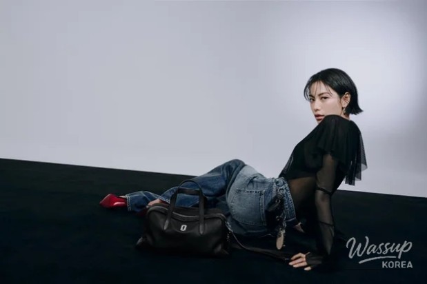 Nana exuding a peaceful yet intense aura in a monochromatic shot