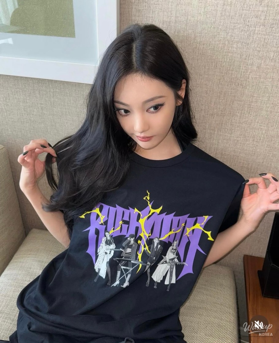 Monochrome black styling with soft glow and refined makeup