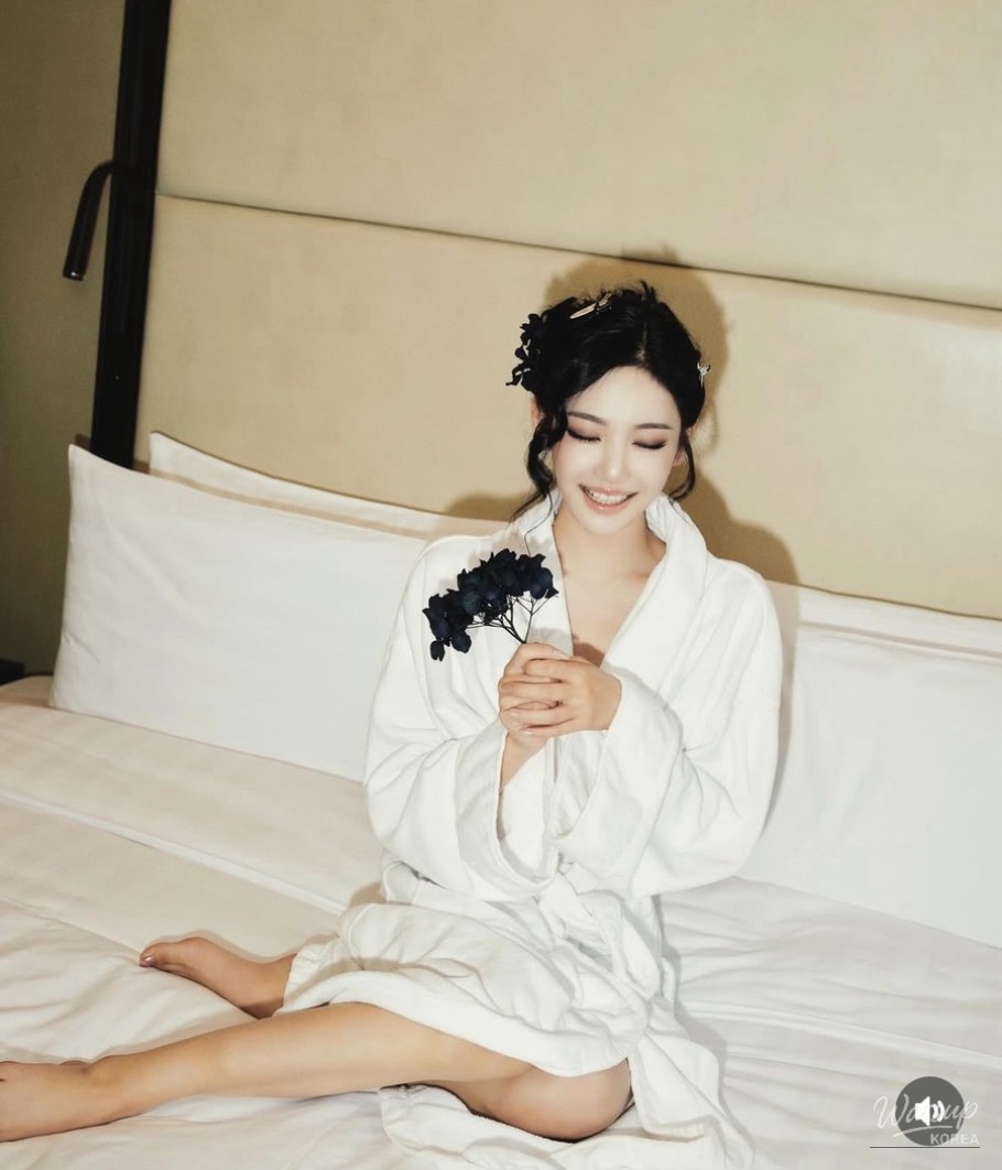 Ningning showcasing contrasting charm in white and black styling on social media