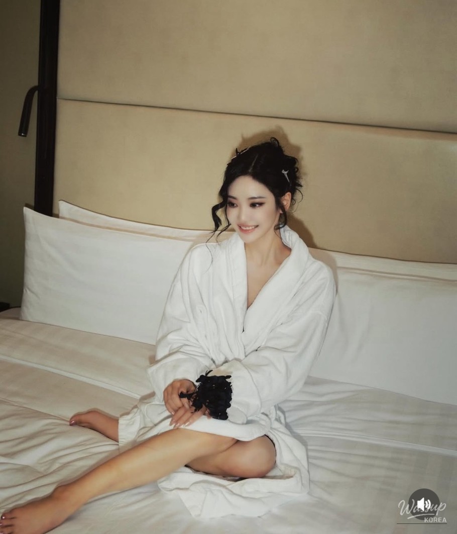 Black off-the-shoulder dress creating a dramatic and glamorous mood