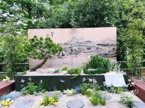 Night view of illuminated garden path during summer operating hours