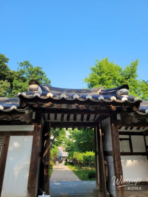 Traditional stone bridge crossing a quiet stream in the park