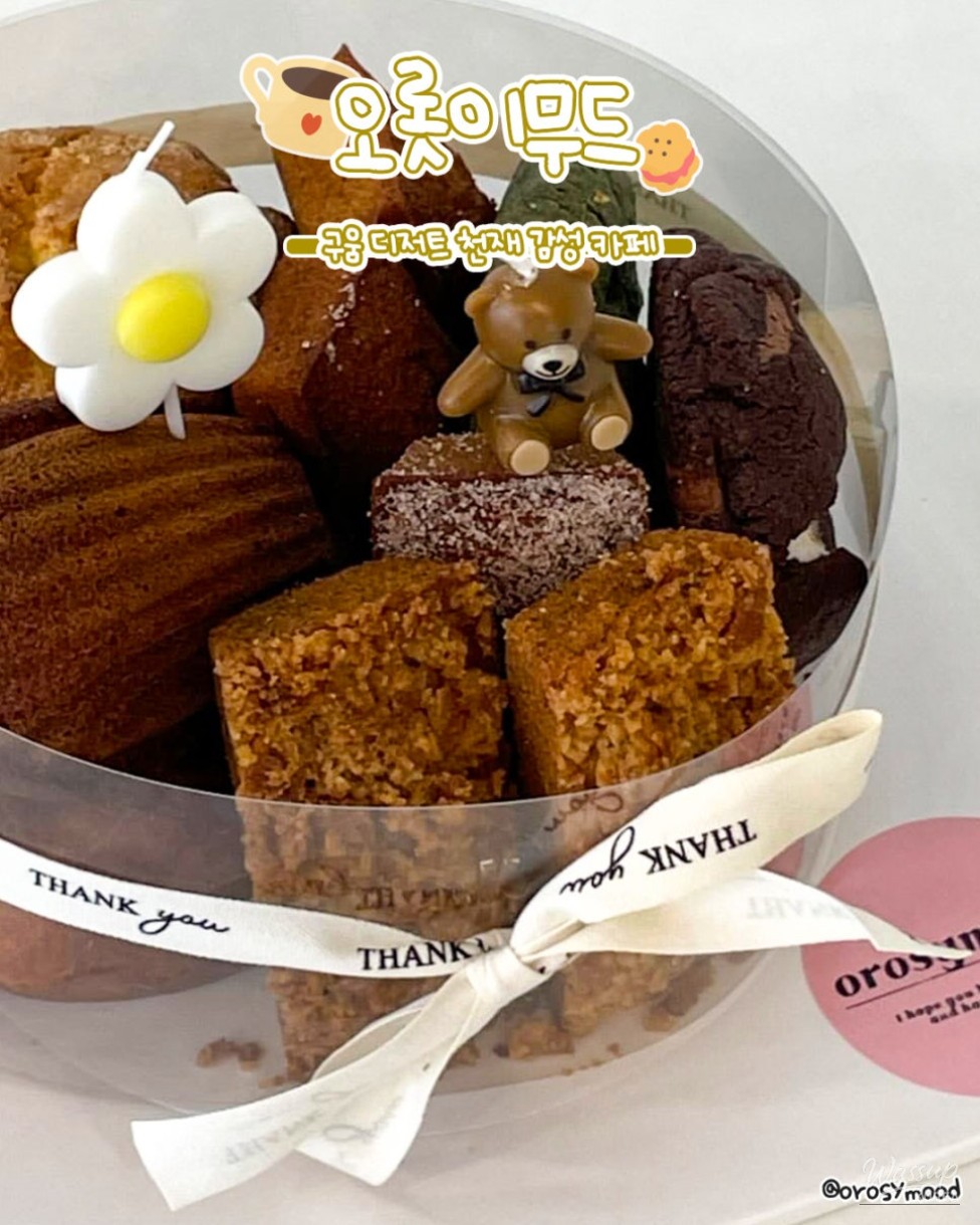 Elegant dessert tray featuring cakes and lattes