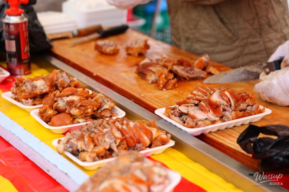 Colorful market stalls filled with agricultural products