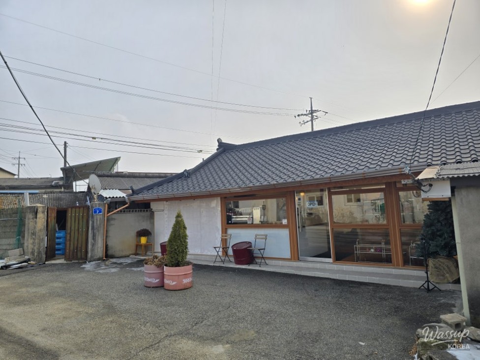 Close up of a thick waffle topped with bananas and strawberries