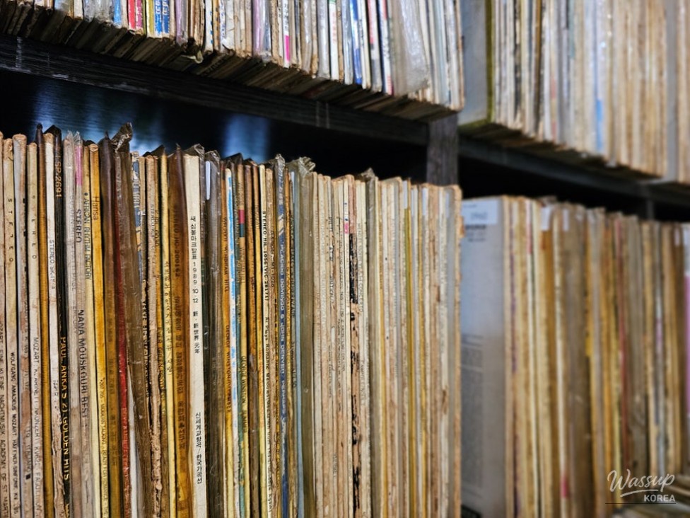 Antique lighting and decor enhancing the retro vibes of the hall