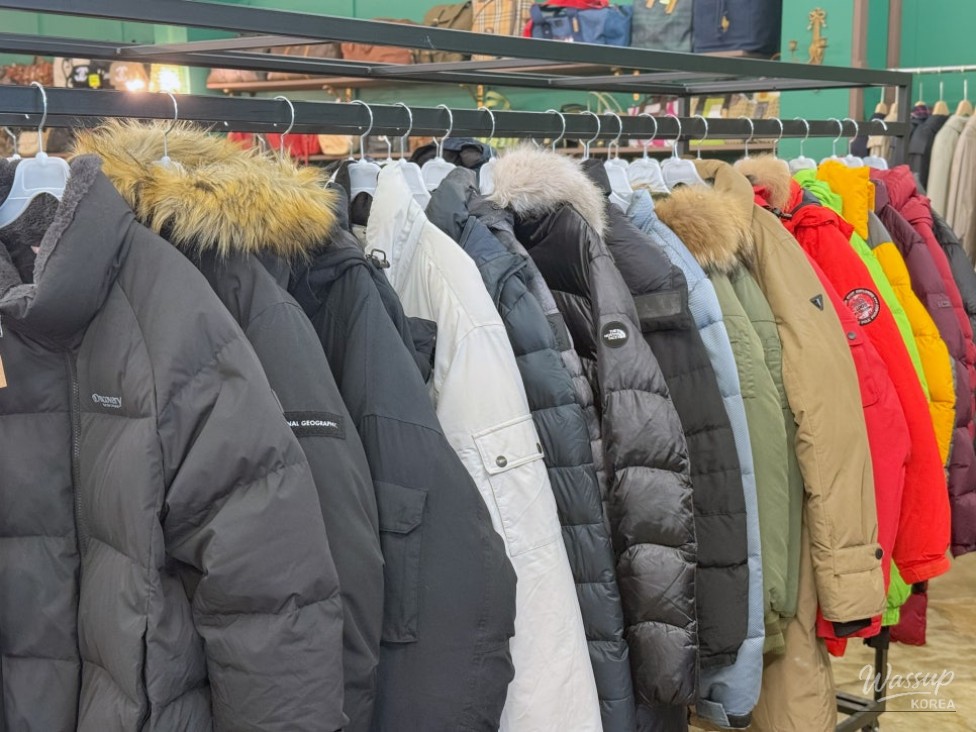 Detailed close-up of brand logos on second-hand items