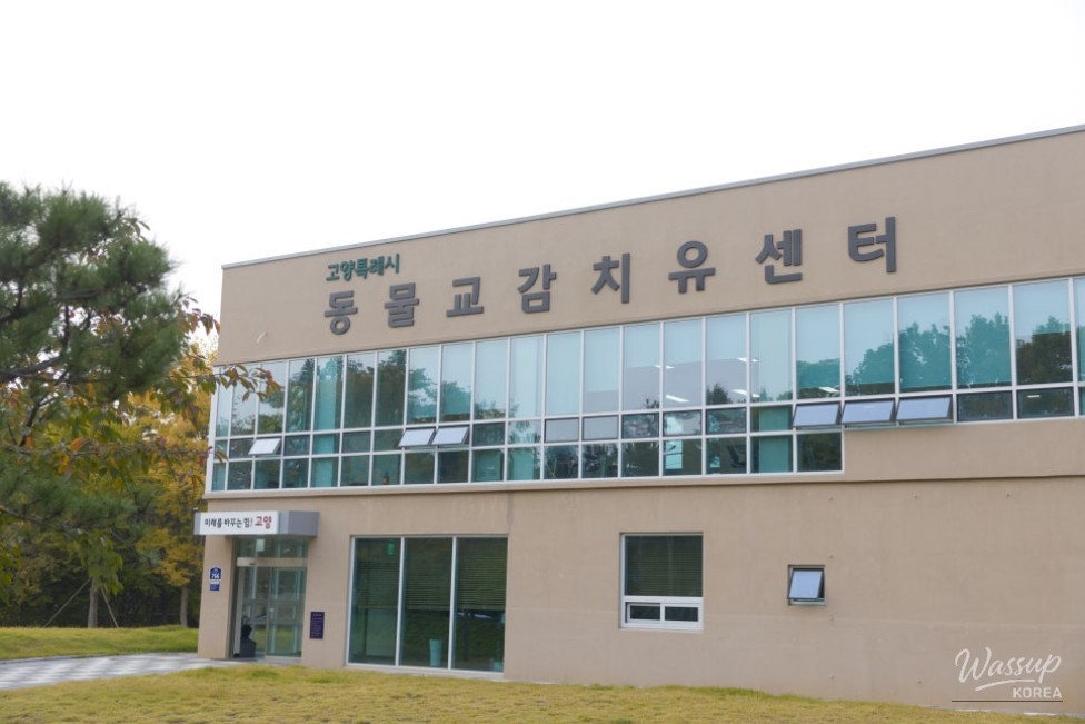 Entry gate showing the QR code authentication system for registered pets