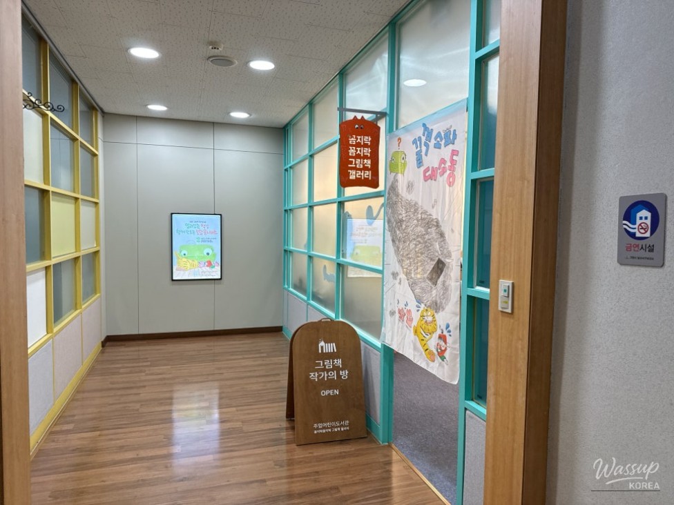 View of the second floor bookshelves from the balcony