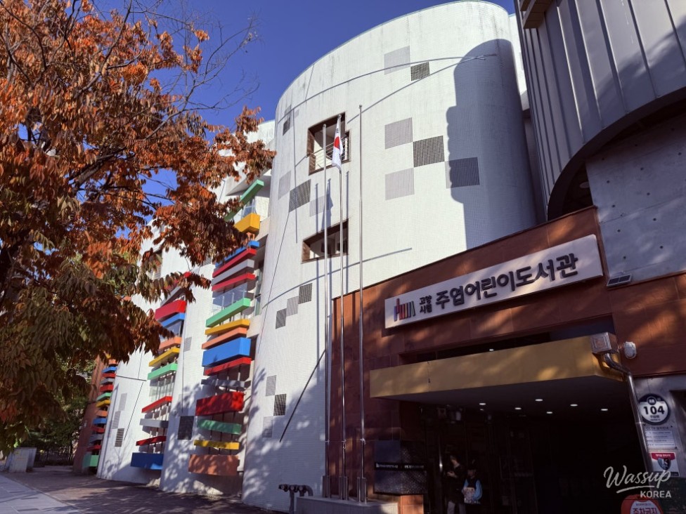 Wooden stairs leading to the second floor of Juyeop Children's Library