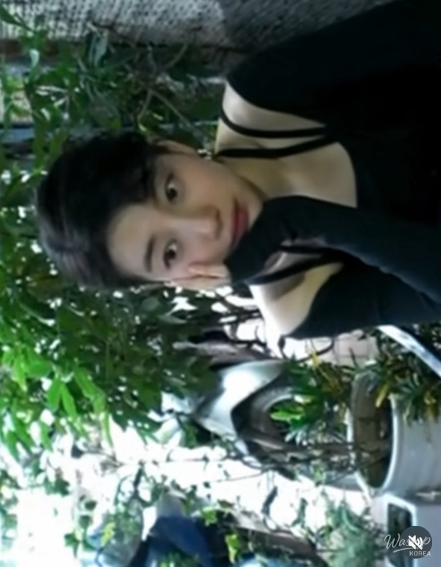 Suzy wearing a black outfit highlighting a mature and restrained image
