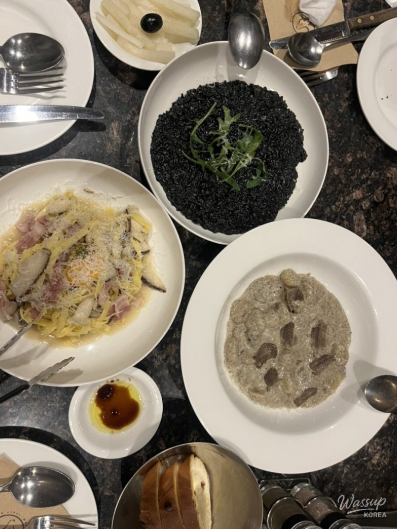 A delicious plate of truffle gnocchi at a festive end-of-year dinner