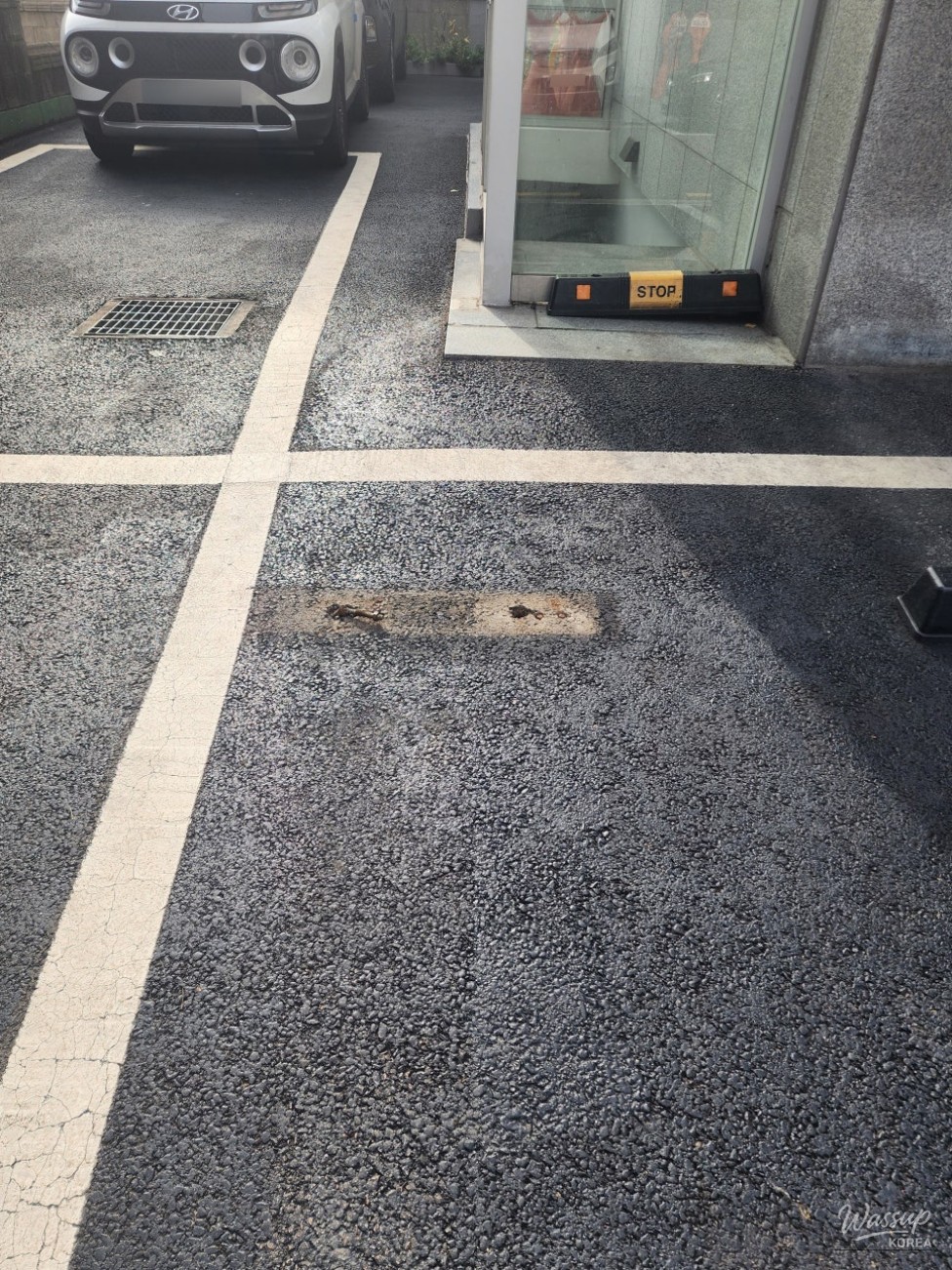 Repair of Parking Stoppers at Shopping Center Entrance_03