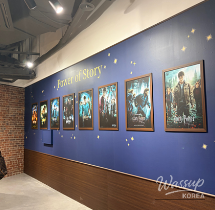 Movie still display section inside the Harry Potter popup store at COEX