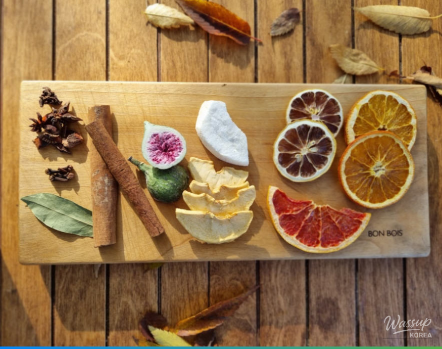 A beautifully prepared mulled wine making kit with various spices and fruits