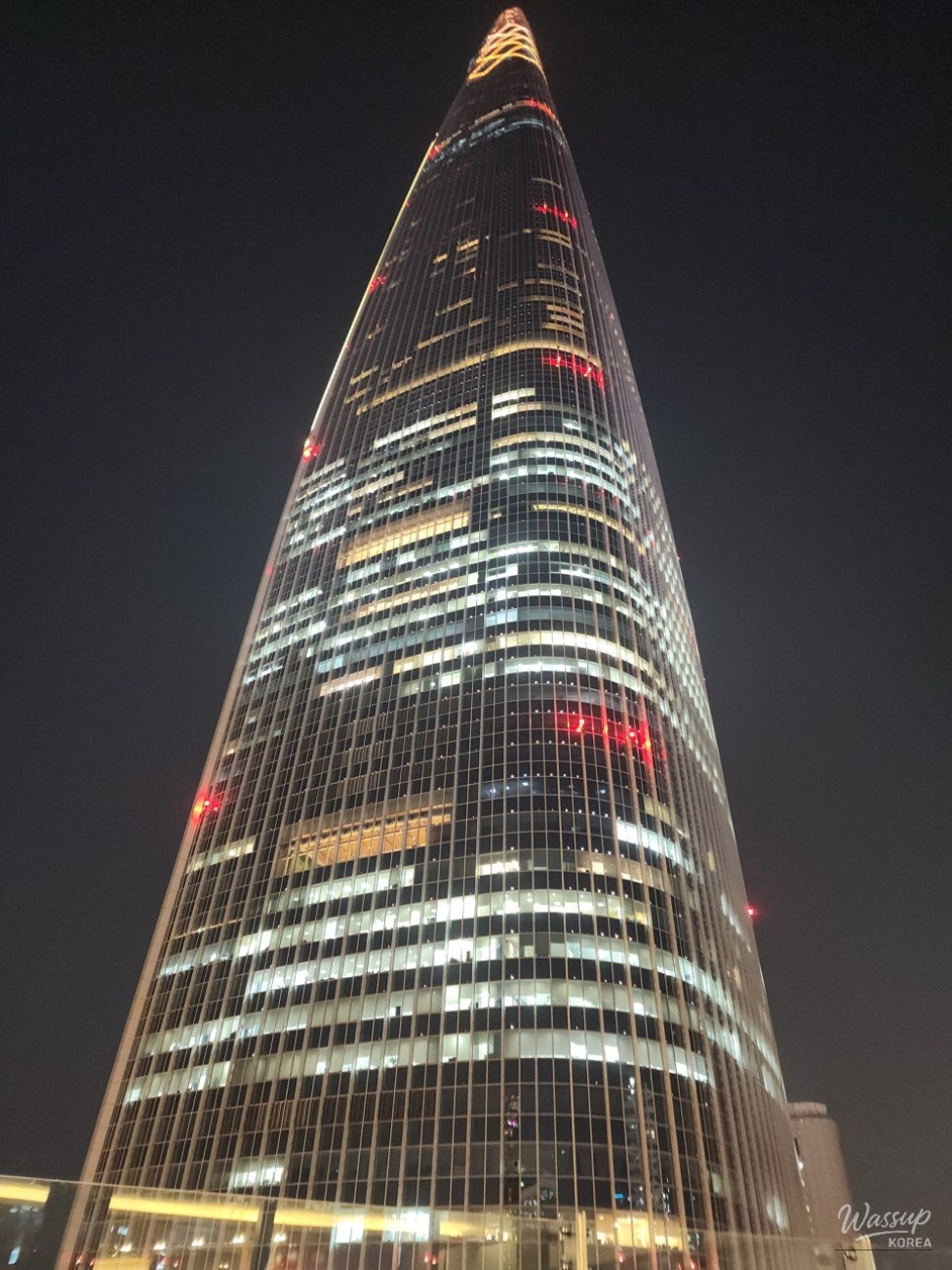 Large string section of the SNU Symphony Orchestra performing together