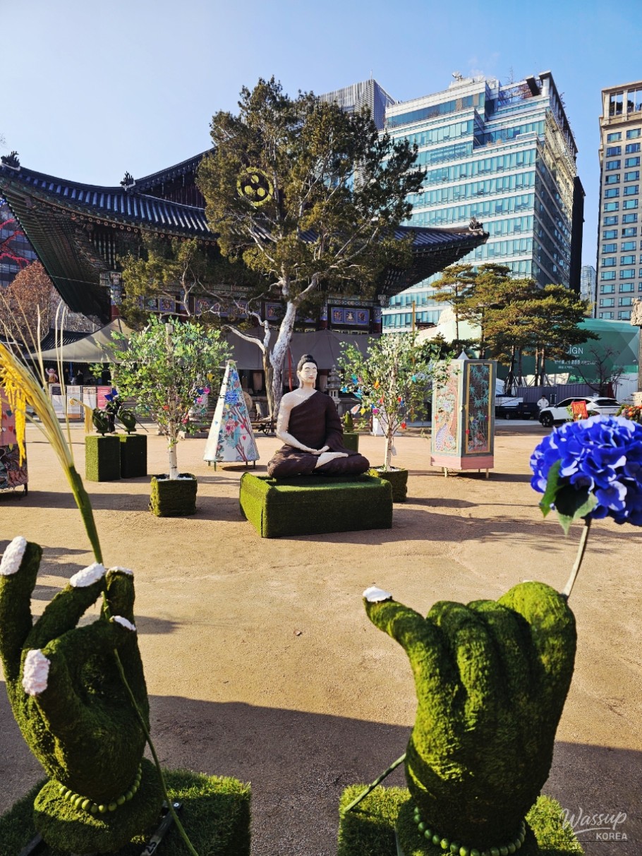 A quiet courtyard scene inside Jogyesa Temple featuring traditional architecture and open spaces