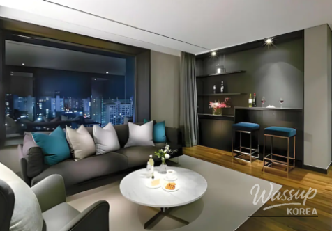 Outdoor swimming pool at Maison Glad Jeju with safety supervision