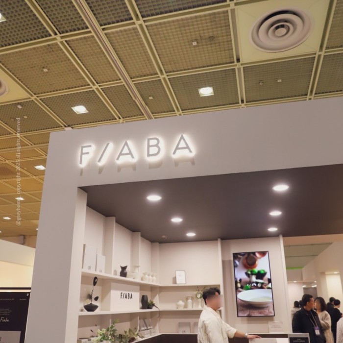 FIABA booth showcasing ceramic dining tables and sofas at the 2025 Home Table Deco Fair