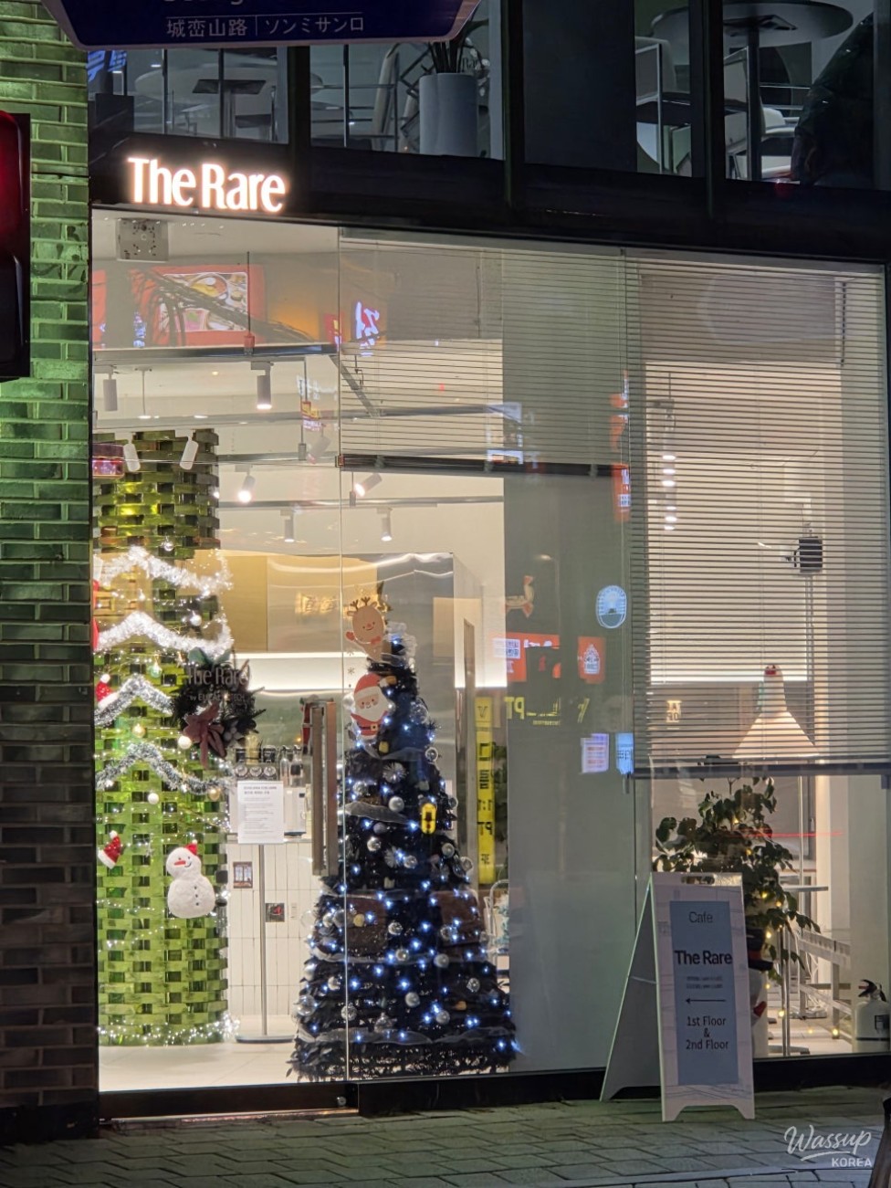 Exterior of a renovated macaroon shop in Yeonnam-dong during evening hours